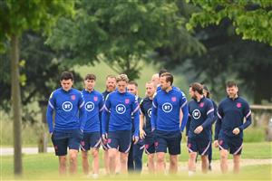 BURTON UPON TRENT, ENGLAND - JUNE 30: Harry Kane of England leads his teammates in a recovery walk at St George's Park on June 30, 2021 in Burton upon Trent, England. (Getty Images)