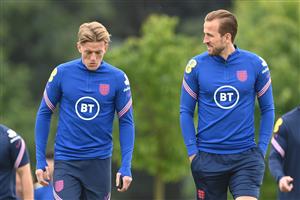 BURTON UPON TRENT, ENGLAND - JUNE 30: Jordan Pickford and Harry Kane of England speak during a recovery walk at St George's Park on June 30, 2021 in Burton upon Trent, England. (Getty Images)