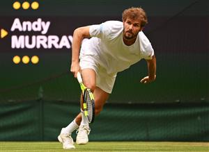 LONDON, ENGLAND - JUNE 30: Oscar Otte of Germany runs to return a shot in his Men's Singles Second Round match against Andy Murray of Great Britain during Day Three of The Championships - Wimbledon 2021 at All England Lawn Tennis and Croquet Club on June 30, 2021 in London, England. (Getty Images)