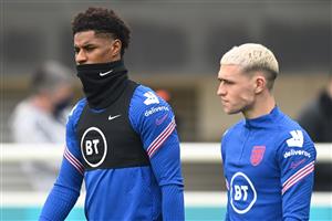 BURTON UPON TRENT, ENGLAND - JUNE 30: Marcus Rashford and Phil Foden of England walk out prior to an England training session at St George's Park on June 30, 2021 in Burton upon Trent, England. (Getty Images)