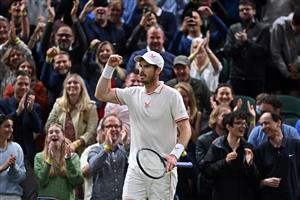 Britain's Andy Murray celebrates winning a game to go up 5-2 in the fifth set against Germany's Oscar Otte during their men's singles second round match on the third day of the 2021 Wimbledon Championships at The All England Tennis Club in Wimbledon, southwest London, on June 30, 2021. (Getty Images)