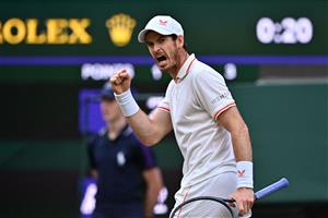 Britain's Andy Murray celebrates breaking the serve of Germany's Oscar Otte during their men's singles second round match on the third day of the 2021 Wimbledon Championships at The All England Tennis Club in Wimbledon, southwest London, on June 30, 2021. (Getty Images)