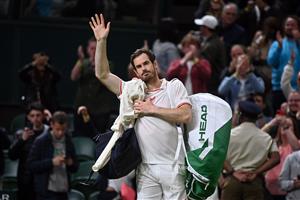 Britain's Andy Murray waves to fans after beating Germany's Oscar Otte during their men's singles second round match on the third day of the 2021 Wimbledon Championships at The All England Tennis Club in Wimbledon, southwest London, on June 30, 2021. (Getty Images)