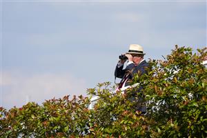 ESHER, ENGLAND - JULY 02: Watching the action at Sandown Racecourse on July 02, 2021 in Esher, England. Due to the Coronavirus pandemic, only owners along with a limited number of the paying public will be allowed to attend the meeting. (Photo by Alan Crowhurst/Getty Images)