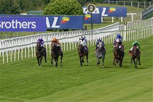 ESHER, ENGLAND - JULY 02: Jason Watson riding Vino Victrix (green) win The Davies Group Handicap at Sandown Racecourse on July 02, 2021 in Esher, England. Due to the Coronavirus pandemic, only owners along with a limited number of the paying public will be allowed to attend the meeting. (Photo by Alan Crowhurst/Getty Images)