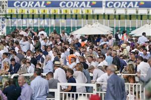 ESHER, ENGLAND - JULY 02: A good sized crowd at Sandown Racecourse on July 02, 2021 in Esher, England. Due to the Coronavirus pandemic, only owners along with a limited number of the paying public will be allowed to attend the meeting. (Photo by Alan Crowhurst/Getty Images)