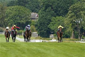 ESHER, ENGLAND - JULY 02: Paul Mulrennan riding Euchen Glen (R, yellow) win The Davies Insurance Services Gala Stakes at Sandown Racecourse on July 02, 2021 in Esher, England. Due to the Coronavirus pandemic, only owners along with a limited number of the paying public will be allowed to attend the meeting. (Photo by Alan Crowhurst/Getty Images)