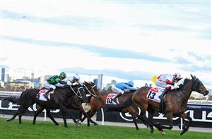 MELBOURNE, AUSTRALIA - JULY 03: Craig Newitt riding Lindhout winning Race 9, the Tcl Leilani Series Final, during Melbourne Racing at Flemington Racecourse on July 03, 2021 in Melbourne, Australia. Jamie Kah riding Barbie