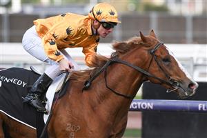 MELBOURNE, AUSTRALIA - JULY 03: Ben Melham riding Royalzel winning Race 4, the Kennedy Taj Rossi Series Final, during Melbourne Racing at Flemington Racecourse on July 03, 2021 in Melbourne, Australia. (Photo by Vince Caligiuri/Getty Images)
