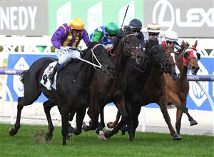 MELBOURNE, AUSTRALIA - JULY 03: Brett Prebble riding Mongolian Marshal winning race 6, the Vrc-crv Winter Championship Series Final, during Melbourne Racing at Flemington Racecourse on July 03, 2021 in Melbourne, Australia. (Photo by Vince Caligiuri/Getty Images)