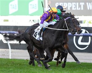 MELBOURNE, AUSTRALIA - JULY 03: Brett Prebble riding Mongolian Marshal winning race 6, the Vrc-crv Winter Championship Series Final, during Melbourne Racing at Flemington Racecourse on July 03, 2021 in Melbourne, Australia. (Photo by Vince Caligiuri/Getty Images)