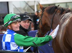 MELBOURNE, AUSTRALIA - JULY 03: Jamie Kah after riding Grand Promenade to win Race 3, the Lexus Banjo Paterson Series Final, during Melbourne Racing at Flemington Racecourse on July 03, 2021 in Melbourne, Australia. (Photo by Vince Caligiuri/Getty Images)