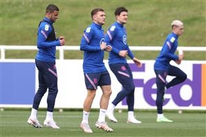 BURTON UPON TRENT, ENGLAND - JULY 05: Kieran Trippier of England and teammates warm up during the England Training Session at St George's Park on July 05, 2021 in Burton upon Trent, England. (Getty Images)