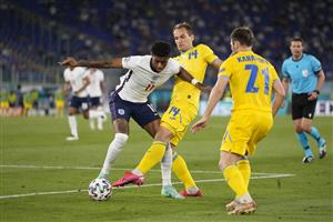 ROME, ITALY - JULY 03: Marcus Rashford of England holds off Yevhen Makarenko of Ukraine during the UEFA Euro 2020 Championship Quarter-final match between Ukraine and England at Olimpico Stadium on July 03, 2021 in Rome, Italy. (Getty Images)