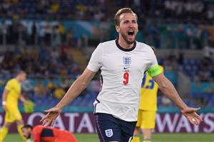 TOPSHOT - England's forward Harry Kane celebrates after scoring the first goal during the UEFA EURO 2020 quarter-final football match between Ukraine and England at the Olympic Stadium in Rome on July 3, 2021. (Getty Images)