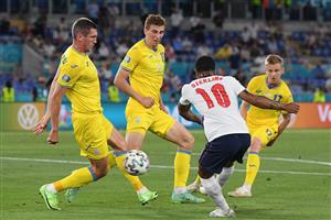 England's forward Raheem Sterling (C) attempts a shot as he is marked during the UEFA EURO 2020 quarter-final football match between Ukraine and England at the Olympic Stadium in Rome on July 3, 2021. (Getty Images)