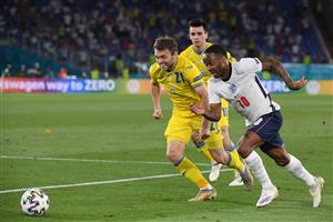 England's forward Raheem Sterling (R) is marked by Ukraine's defender Oleksandr Karavaev during the UEFA EURO 2020 quarter-final football match between Ukraine and England at the Olympic Stadium in Rome on July 3, 2021. (Getty Images)