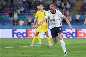 TOPSHOT - England's midfielder Jordan Henderson celebrates scoring the team's fourth goal during the UEFA EURO 2020 quarter-final football match between Ukraine and England at the Olympic Stadium in Rome on July 3, 2021. (Getty Images)