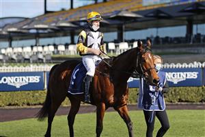 SYDNEY, AUSTRALIA - JULY 03: Tommy Berry on Our Bellagio Miss returns to scale after winning race 5 the Midway Handicap during Sydney Racing at Rosehill Gardens on July 03, 2021 in Sydney, Australia. (Photo by Mark Evans/Getty Images)