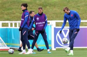BURTON UPON TRENT, ENGLAND - JULY 06: Harry Kane of England juggles the ball during the England Training Session at St George's Park on July 06, 2021 in Burton upon Trent, England. (Getty Images)