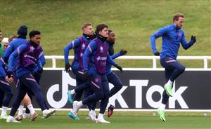 BURTON UPON TRENT, ENGLAND - JULY 06: Harry Kane, Harry Maguire of England and teammates warm up during the England Training Session at St George's Park on July 06, 2021 in Burton upon Trent, England. (Getty Images)