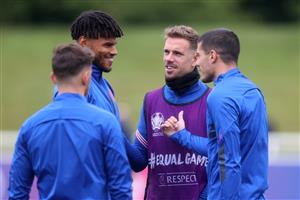 BURTON UPON TRENT, ENGLAND - JULY 06: Tyrone Mings, Jordan Henderson and Conor Coady of England speak during the England Training Session at St George's Park on July 06, 2021 in Burton upon Trent, England. (Getty Images)