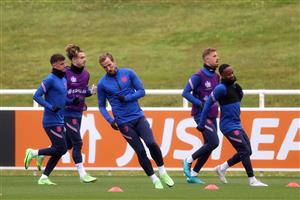 BURTON UPON TRENT, ENGLAND - JULY 06: Harry Kane of England and teammates warm up during the England Training Session at St George's Park on July 06, 2021 in Burton upon Trent, England. (Getty Images)