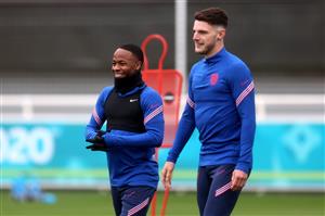 BURTON UPON TRENT, ENGLAND - JULY 06: Raheem Sterling and Declan Rice of England look on during the England Training Session at St George's Park on July 06, 2021 in Burton upon Trent, England. (Getty Images)