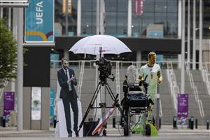 LONDON, ENGLAND - JULY 07: Cardboard figures of Gareth Southgate and Harry Kane are seen with a TV camera outside Wembley Stadium on July 07, 2021 in London, England. England has reached the semi-finals of the UEFA European Football Championship 2020 hoping to make the final for the first time in the history of the competition. (Getty Images)