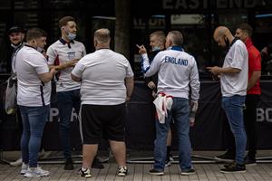 LONDON, ENGLAND - JULY 07: England fans queue to get in to Boxpark Wembley on July 07, 2021 in London, England. England has reached the semi-finals of the UEFA European Football Championship 2020 hoping to make the final for the first time in the history of the competition. (Getty Images)