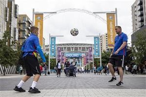 LONDON, ENGLAND - JULY 07: England fans kick a football about on Wembley Way on July 07, 2021 in London, England. England has reached the semi-finals of the UEFA European Football Championship 2020 hoping to make the final for the first time in the history of the competition. (Getty Images)