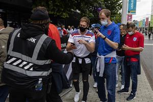LONDON, ENGLAND - JULY 07: England fans queue to get in to Boxpark Wembley on July 07, 2021 in London, England. England has reached the semi-finals of the UEFA European Football Championship 2020 hoping to make the final for the first time in the history of the competition. (Getty Images)