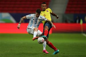 BRASILIA, BRAZIL - JULY 06: Rodrigo De Paul of Argentina competes for the ball with William Tesillo of Colombia during a semi-final match of Copa America Brazil 2021 between Argentina and Colombia at Mane Garrincha Stadium on July 06, 2021 in Brasilia, Brazil. (Getty Images)