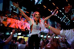 England supporters celebrate victory at the final whistle of the UEFA EURO 2020 semi-final football match between England and Denmark, at Boxpark Croydon in south London on July 7, 2021. (Getty Images)