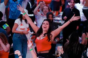 England supporters celebrate victory after the UEFA EURO 2020 semi-final football match between England and Denmark, at the 4TheFans Fan Park in Manchester, northwest England on July 7, 2021. (Getty Images)