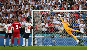 England's goalkeeper Jordan Pickford (R) concedes a goal during the UEFA EURO 2020 semi-final football match between England and Denmark at Wembley Stadium in London on July 7, 2021. (Getty Images)