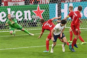 Denmark's goalkeeper Kasper Schmeichel (L) saves a shot during the UEFA EURO 2020 semi-final football match between England and Denmark at Wembley Stadium in London on July 7, 2021. (Getty Images)