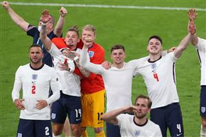 (From L) England's players celebrate their win in the UEFA EURO 2020 semi-final football match between England and Denmark at Wembley Stadium in London on July 7, 2021. (Getty Images)