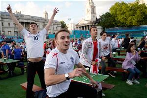 England supporters watch the UEFA EURO 2020 semi-final football match between England and Denmark, at a fanzone in Trafalgar square, central London on July 7, 2021. (Getty Images)