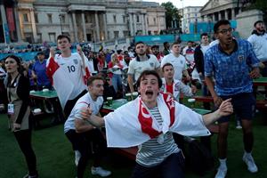 England supporters react as they watch the UEFA EURO 2020 semi-final football match between England and Denmark, at a fanzone in Trafalgar square, central London on July 7, 2021. (Getty Images)