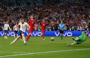 LONDON, ENGLAND - JULY 07: Harry Kane of England scores from the rebound of a missed penalty for their team's second goal during the UEFA Euro 2020 Championship Semi-final match between England and Denmark at Wembley Stadium on July 07, 2021 in London, England. (Getty Images)