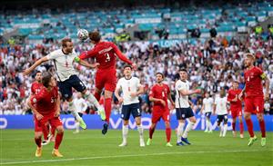 LONDON, ENGLAND - JULY 07: Harry Kane of England competes for a header with Jannik Vestergaard of Denmark during the UEFA Euro 2020 Championship Semi-final match between England and Denmark at Wembley Stadium on July 07, 2021 in London, England. (Getty Images)