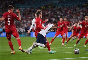 LONDON, ENGLAND - JULY 07: Raheem Sterling of England is fouled by Mathias Jensen of Denmark inside the penalty area, leading to England being awarded a penalty during the UEFA Euro 2020 Championship Semi-final match between England and Denmark at Wembley Stadium on July 07, 2021 in London, England. (Getty Images)