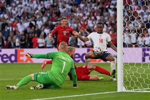 LONDON, ENGLAND - JULY 07: Simon Kjaer of Denmark scores an own goal past Kasper Schmeichel of Denmark for England's first goal during the UEFA Euro 2020 Championship Semi-final match between England and Denmark at Wembley Stadium on July 07, 2021 in London, England. (Getty Images)