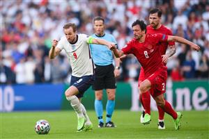 LONDON, ENGLAND - JULY 07: Harry Kane of England runs with the ball under pressure from Thomas Delaney of Denmark during the UEFA Euro 2020 Championship Semi-final match between England and Denmark at Wembley Stadium on July 07, 2021 in London, England. (Getty Images)