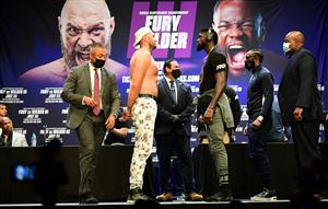 Boxers Tyson Fury and Deontay Wilder face-off on June 15, 2021 in Los Angeles, California at a press conference to announce their third WBC heavyweight championship fight scheduled for July 24 in Las Vegas. (Getty Images)