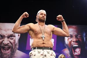 LOS ANGELES, CALIFORNIA - JUNE 15: Tyson Fury steps up for a face off with Deontay Wilder at the press conference at The Novo by Microsoft at L.A. Live on June 15, 2021 in Los Angeles, California. (Getty Images)