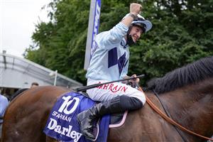 NEWMARKET, ENGLAND - JULY 10: Tom Marquand riding Starman celebrates after winning The Darley July Cup Stakes at Newmarket Racecourse on July 10, 2021 in Newmarket, England. Due to the Coronavirus pandemic, only owners along with a limited number of the paying public will be allowed to attend the meeting. (Photo by Alan Crowhurst/Getty Images)