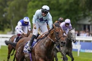 NEWMARKET, ENGLAND - JULY 10: Tom Marquand riding Starman celebrates as he crosses the line to win The Darley July Cup Stakes at Newmarket Racecourse on July 10, 2021 in Newmarket, England. Due to the Coronavirus pandemic, only owners along with a limited number of the paying public will be allowed to attend the meeting. (Photo by Alan Crowhurst/Getty Images)