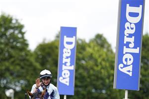 NEWMARKET, ENGLAND - JULY 10: Tom Marquand riding Starman celebrates after winning The Darley July Cup Stakes at Newmarket Racecourse on July 10, 2021 in Newmarket, England. Due to the Coronavirus pandemic, only owners along with a limited number of the paying public will be allowed to attend the meeting. (Photo by Alan Crowhurst/Getty Images)